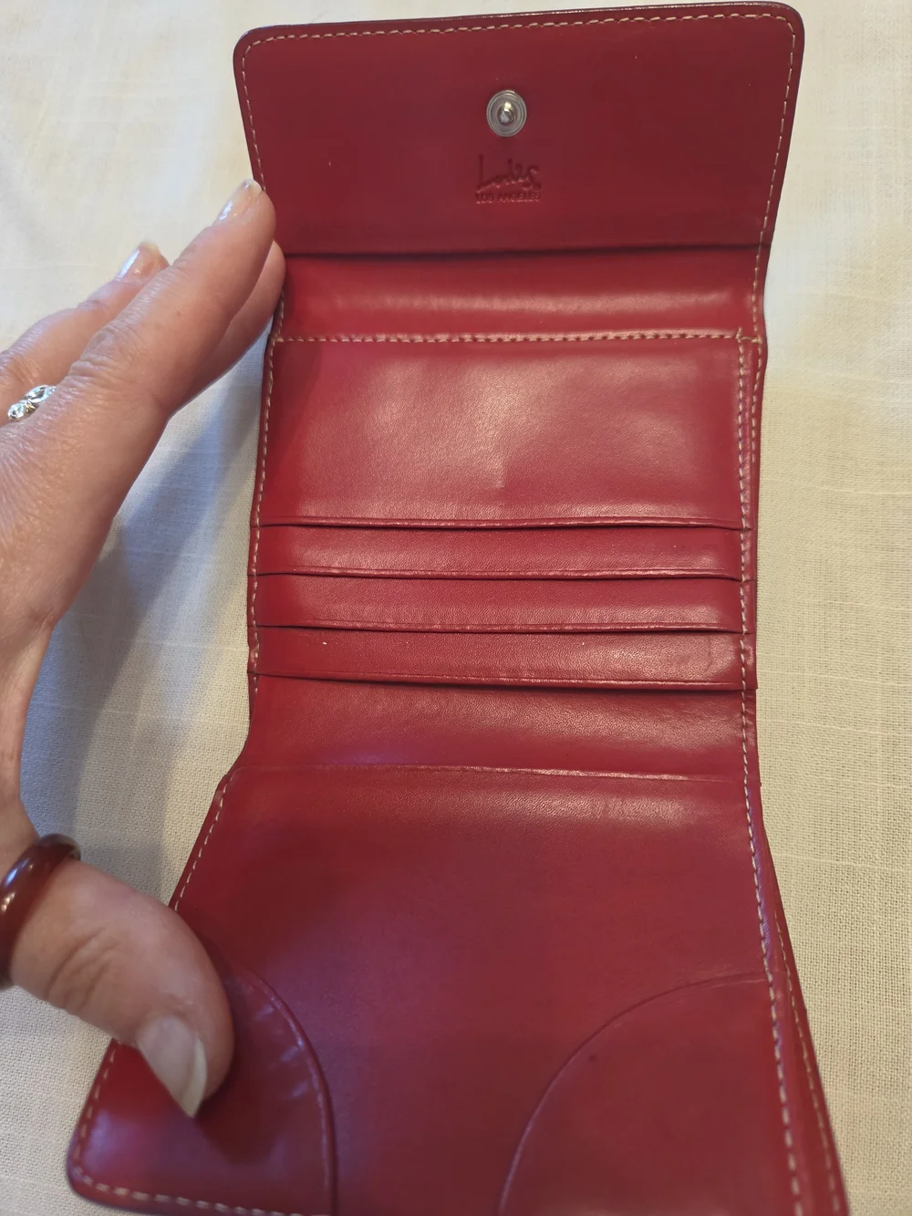 Lodis Black Leather Bi-Fold Wallet with Red Trim